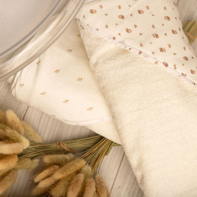 Hooded Towel with Floral Eyelet Binding