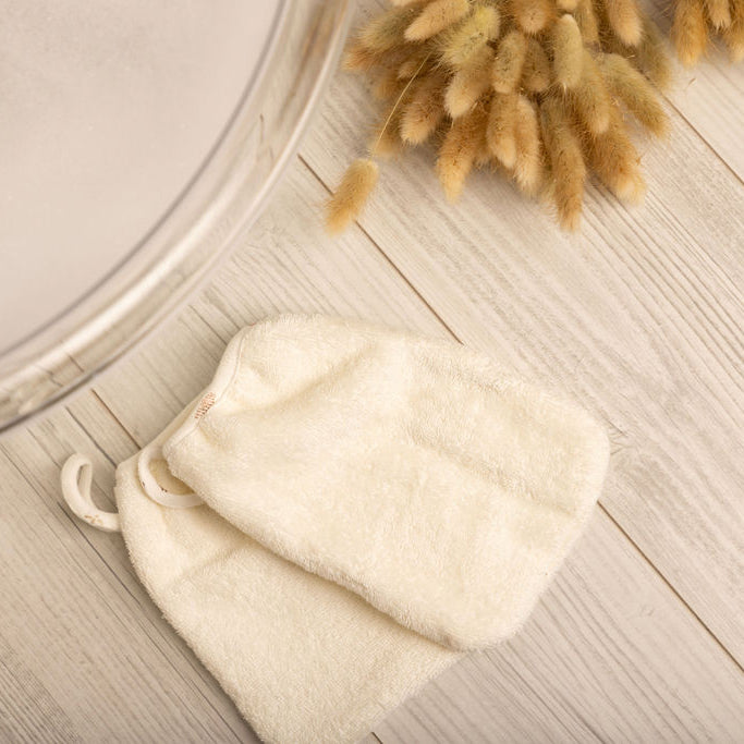 Hooded Towel with Floral Eyelet Binding