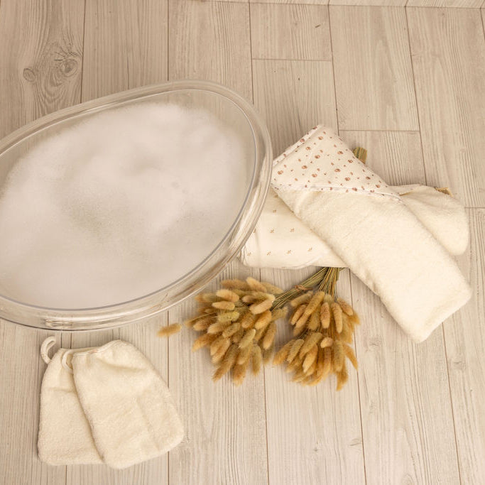 Hooded Towel with Floral Eyelet Binding